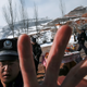 Armed police attempt to prevent a photographer from taking pictures at the entrance to the village of Taktser, known in Chinese as Hongya, where the Dalai Lama was born in 1935, Qinghai province, China March 9, 2019.